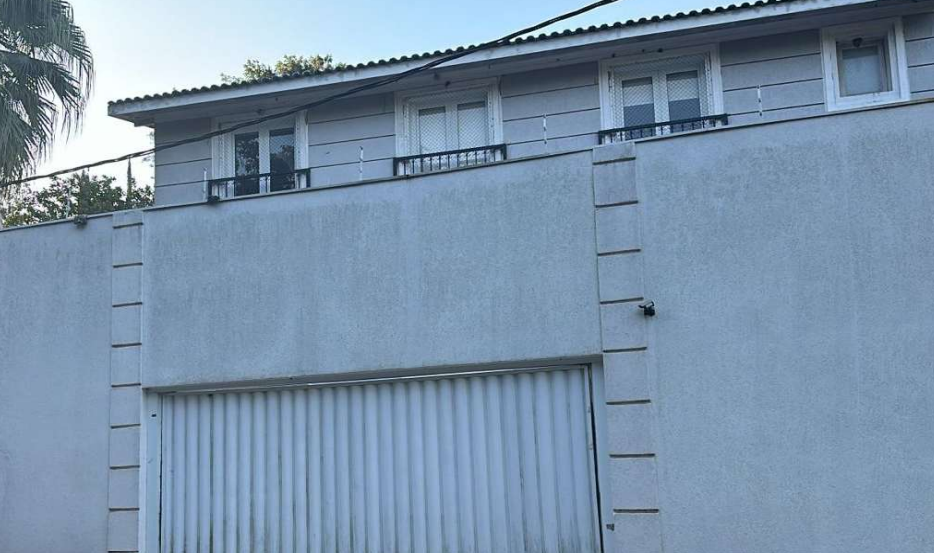 CASA EM CIDADE JARDIM - Pessoa Leilões