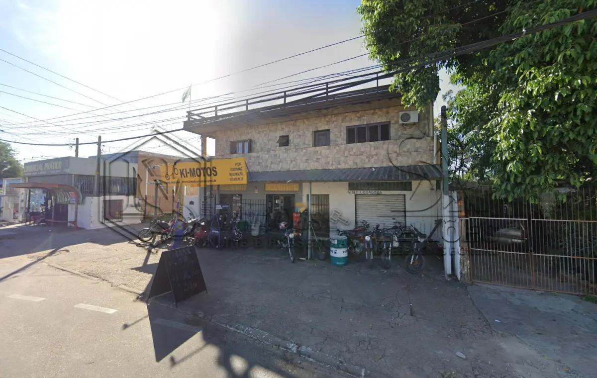 50% do terreno correspondente a integralidade do prédio comercial e residencial